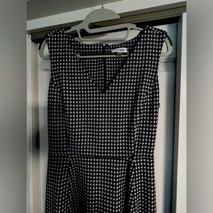 Black and white checker Calvin Klein. Worn once. Like-new condition